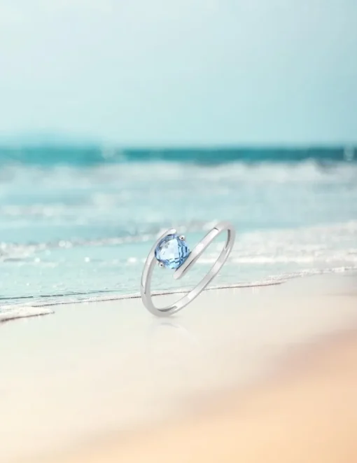 Bague classique or blanc 375‰, topaze SO OR
