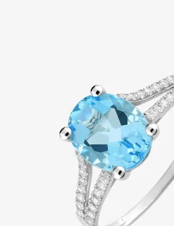 Bague en or blanc 750 ‰ avec topaze bleue, oxyde de zirconium SO OR