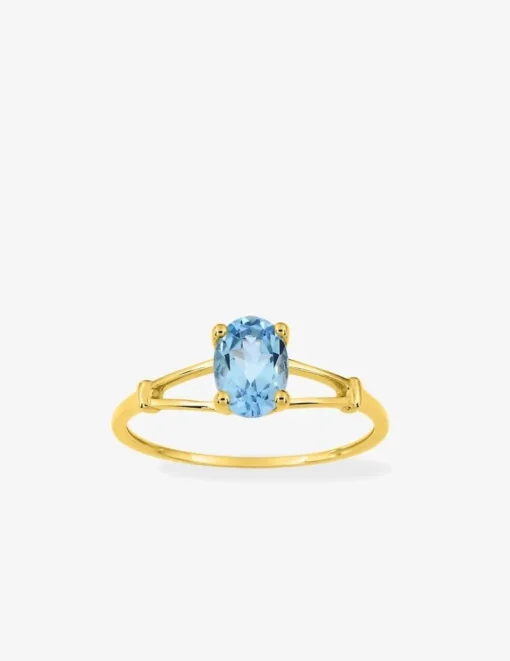 Bague en or jaune 375 ‰ et topaze bleue traitée SO OR
