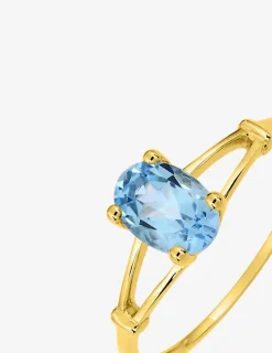 Bague en or jaune 375 ‰ et topaze bleue traitée SO OR