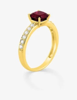 Bague en or jaune 375 ‰, rubis et diamants synthétiques 0,26 ct SO OR