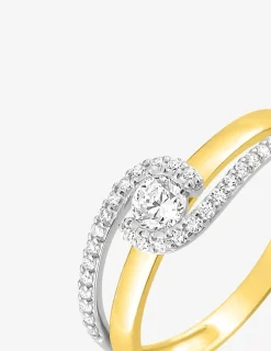Bague fantaisie solitaire accompagné or jaune 750 ‰, rhodium et oxyde de zirconium SO OR