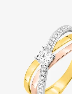 Bague fantaisie solitaire accompagné 3 ors 750 ‰ avec pavage d'oxydes de zirconium SO OR