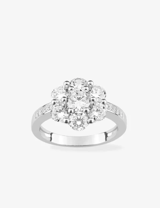 Bague fleur accompagnée argent rhodié 925 ‰ et oxyde de zirconium SO OR