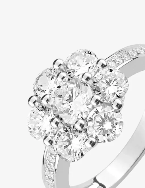 Bague fleur accompagnée argent rhodié 925 ‰ et oxyde de zirconium SO OR