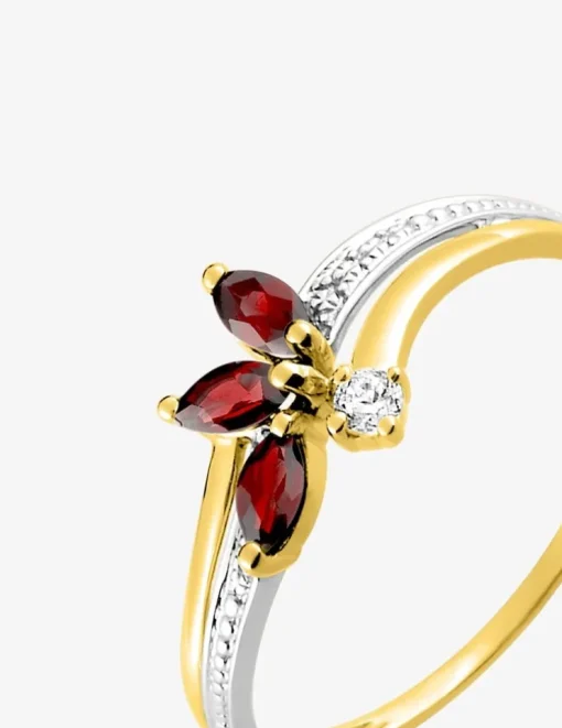 Bague fleur en or jaune 375‰, rubis et oxyde de zirconium SO OR