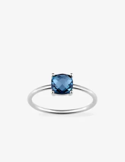 Bague or blanc 750 ‰ et topaze bleue traitée SO OR