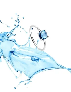 Bague or blanc 750 ‰ et topaze bleue traitée SO OR
