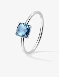 Bague or blanc 750 ‰ et topaze bleue traitée SO OR