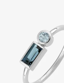 Bague or blanc 750 ‰ topaze bleue traitée SO OR