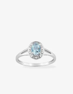 Bague or blanc 750 ‰, topaze et oxydes de zirconium SO OR