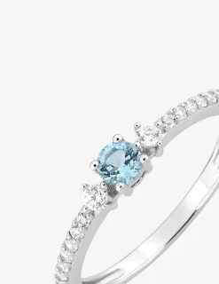 Bague or blanc 375 ‰ topaze traitée et oxydes de zirconium SO OR