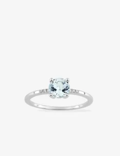 Bague or blanc 375‰, topaze, oxyde de zirconium SO OR