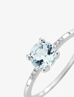 Bague or blanc 375‰, topaze, oxyde de zirconium SO OR