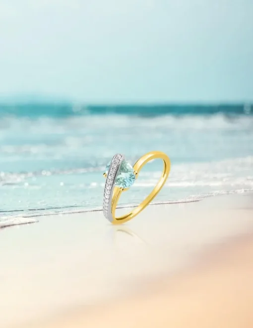 Bague or jaune 375‰, aigue-marine, oxyde de zirconium SO OR