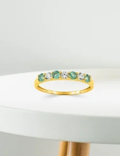 Bague or jaune 375‰, émeraudes, oxydes de zirconium SO OR