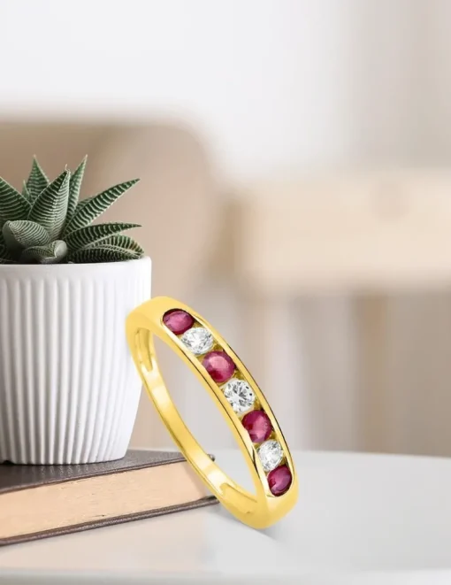 Bague or jaune 375‰, rubis et oxyde de zirconium SO OR