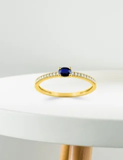 Bague or jaune 375‰, saphir et oxyde de zirconium SO OR