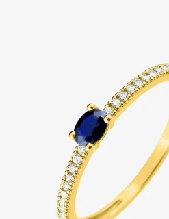 Bague or jaune 375‰, saphir et oxyde de zirconium SO OR