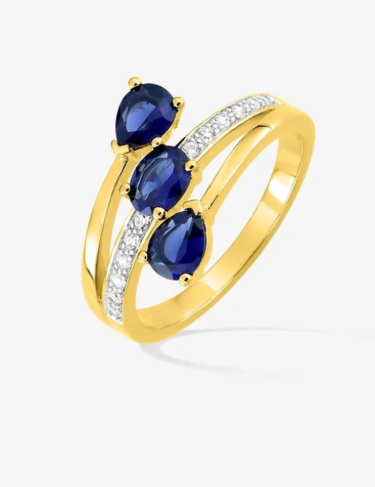 Bague plaqué or, rhodium et trilogie oxydes de zirconium bleus SO OR