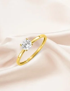 Bague solitaire 4 griffes or jaune 375 ‰ et oxyde de zirconium SO OR