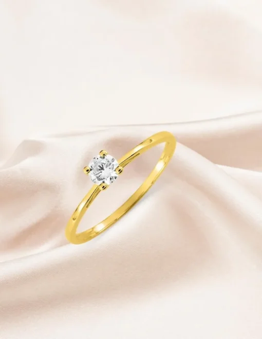 Bague solitaire 4 griffes or jaune 375 ‰ et oxyde de zirconium SO OR