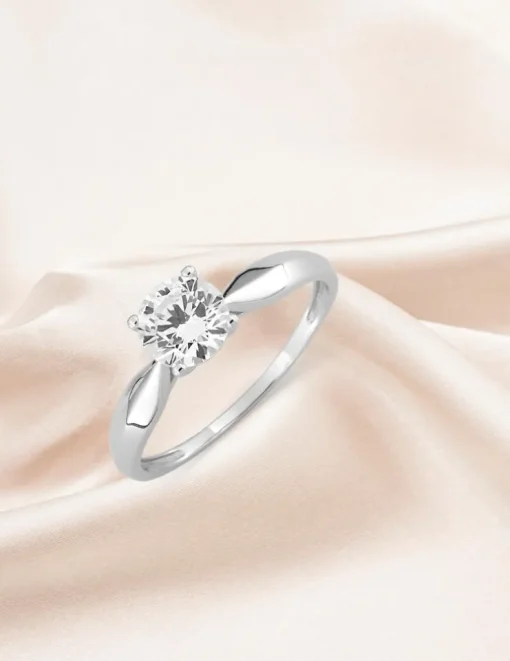 Bague solitaire 4 griffes or blanc 375 ‰ et oxyde de zirconium SO OR