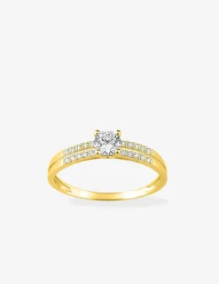 Bague solitaire accompagné or jaune 375 ‰ et oxydes de zirconium SO OR