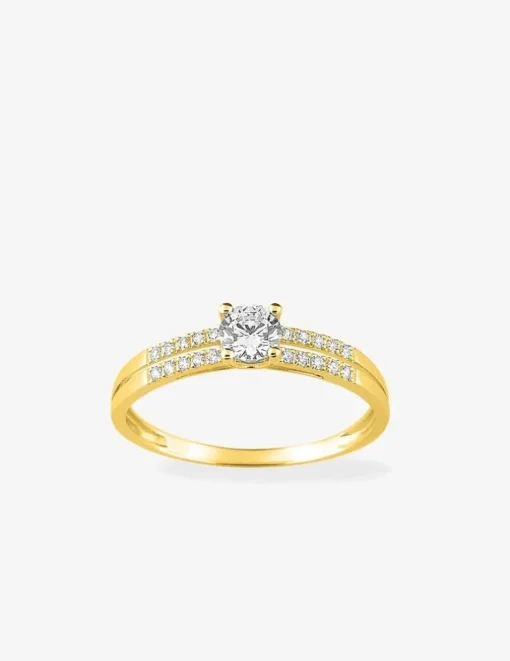 Bague solitaire accompagné or jaune 375 ‰ et oxydes de zirconium SO OR