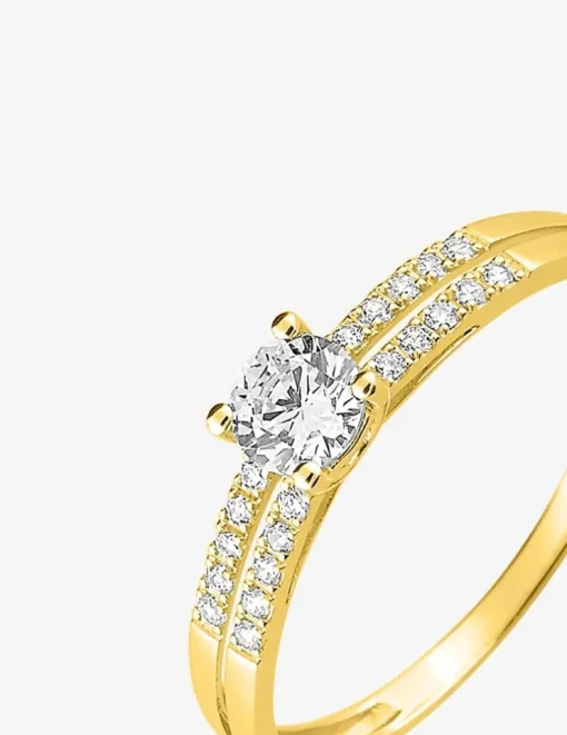 Bague solitaire accompagné or jaune 375 ‰ et oxydes de zirconium SO OR