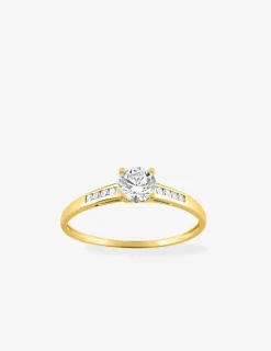 Bague solitaire accompagné or jaune 375 ‰ et oxydes de zirconium SO OR