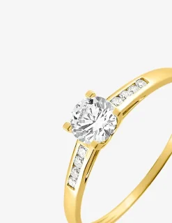 Bague solitaire accompagné or jaune 375 ‰ et oxydes de zirconium SO OR