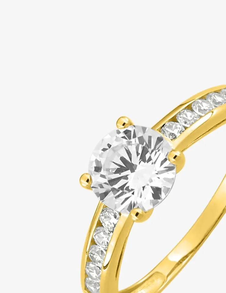 Bague solitaire accompagné or jaune 375 ‰ et oxydes de zirconium SO OR