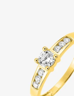 Bague solitaire accompagné or jaune 375 ‰ et oxydes de zirconium SO OR