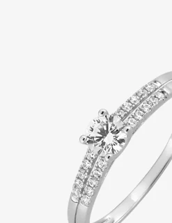 Bague solitaire accompagné or blanc 375 ‰ et oxydes de zirconium SO OR