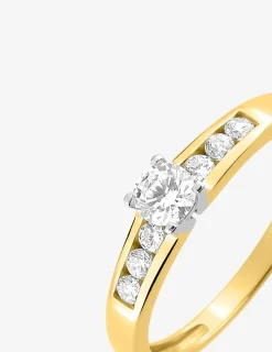 Bague solitaire accompagné or jaune 750 ‰, rhodium et oxyde de zirconium SO OR