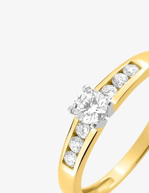 Bague solitaire accompagné or jaune 750 ‰, rhodium et oxyde de zirconium SO OR