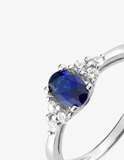 Bague solitaire accompagné argent rhodié 925 ‰ et oxyde de zirconium bleu foncé SO OR