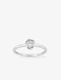 Bague solitaire or 375 ‰ blanc diamant synthétique 0,20 ct serti clos SO OR
