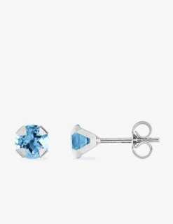 Boucles d'oreilles clou or 750‰ topaze bleu serti griffes SO OR