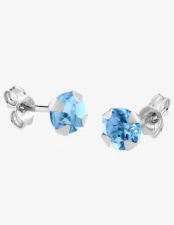 Boucles d'oreilles clou or 750‰ topaze bleu serti griffes SO OR