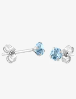 Boucles d'oreilles clous or blanc 750 ‰ et topazes bleues SO OR