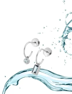 Boucles d'oreilles or blanc 750 ‰ topaze bleue traitée SO OR