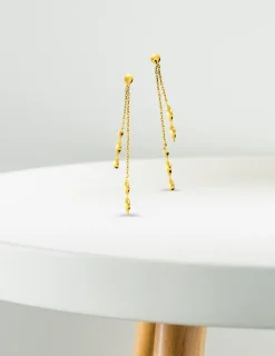 Boucles d'oreilles pendantes motifs torsadés or jaune 750 ‰ SO OR