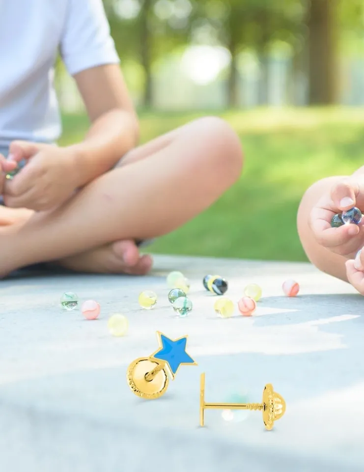 Boucles d'oreilles étoile or jaune 375‰ et laque SO OR