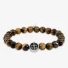 Bracelet acier croix et perles fantaisie SO OR