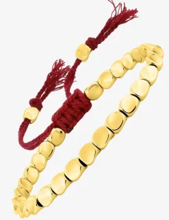 Bracelet cordon rouge avec des détails en cuivre doré SO OR