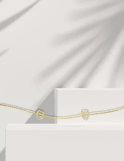 Bracelet double cœurs bicolore 375 ‰ SO OR