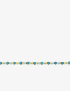 Bracelet en acier doré avec turquoises synthétique et boules de verre bleu SO OR