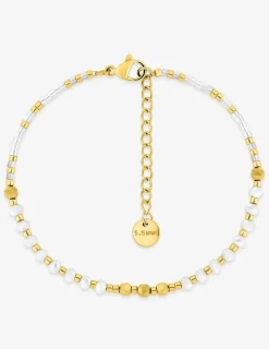 Bracelet en acier doré, boules de verre blanches SO OR